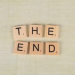 close up of scrabble tiles forming the words the end