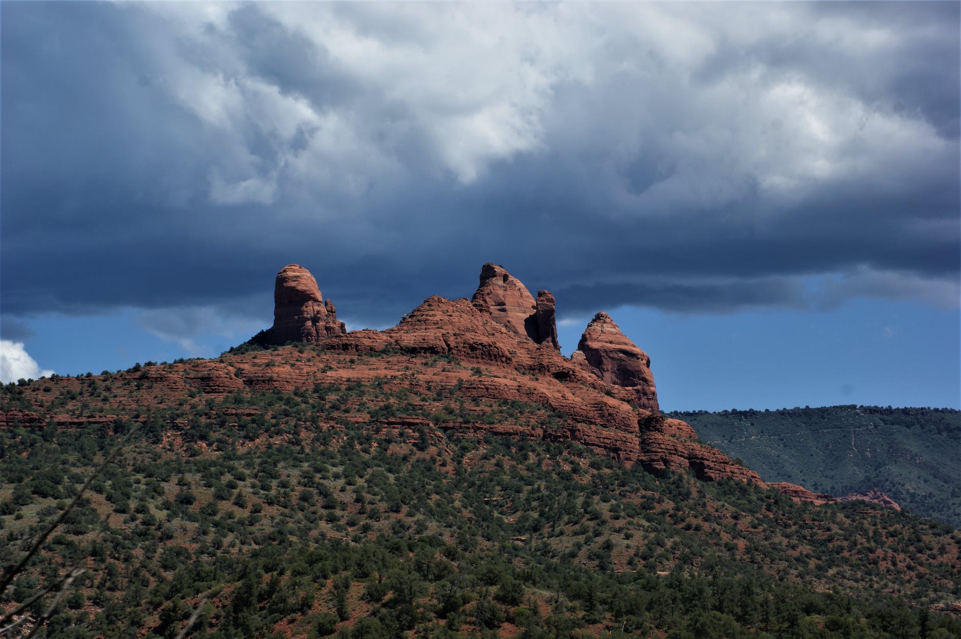rocky formations under cloudy sky