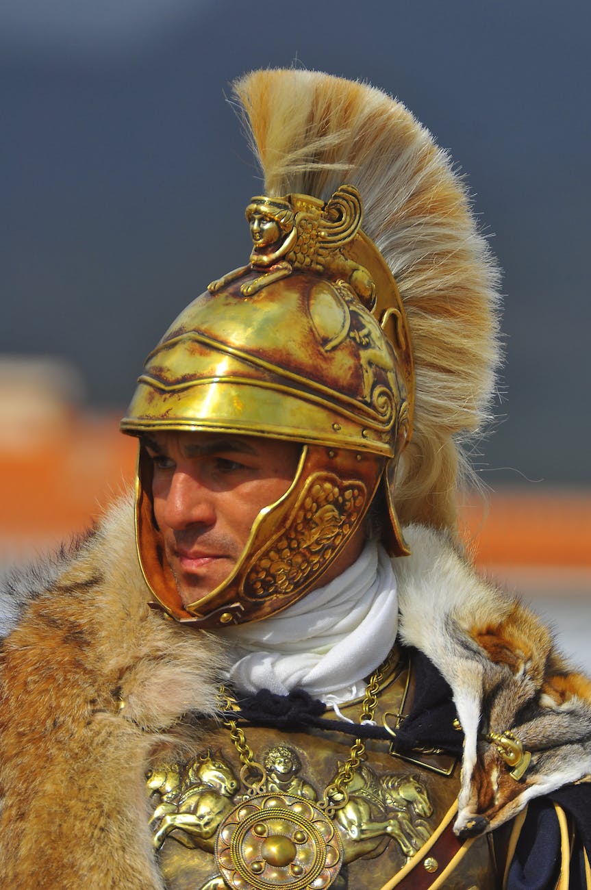 portrait of a man in a roman warrior costume with helmet